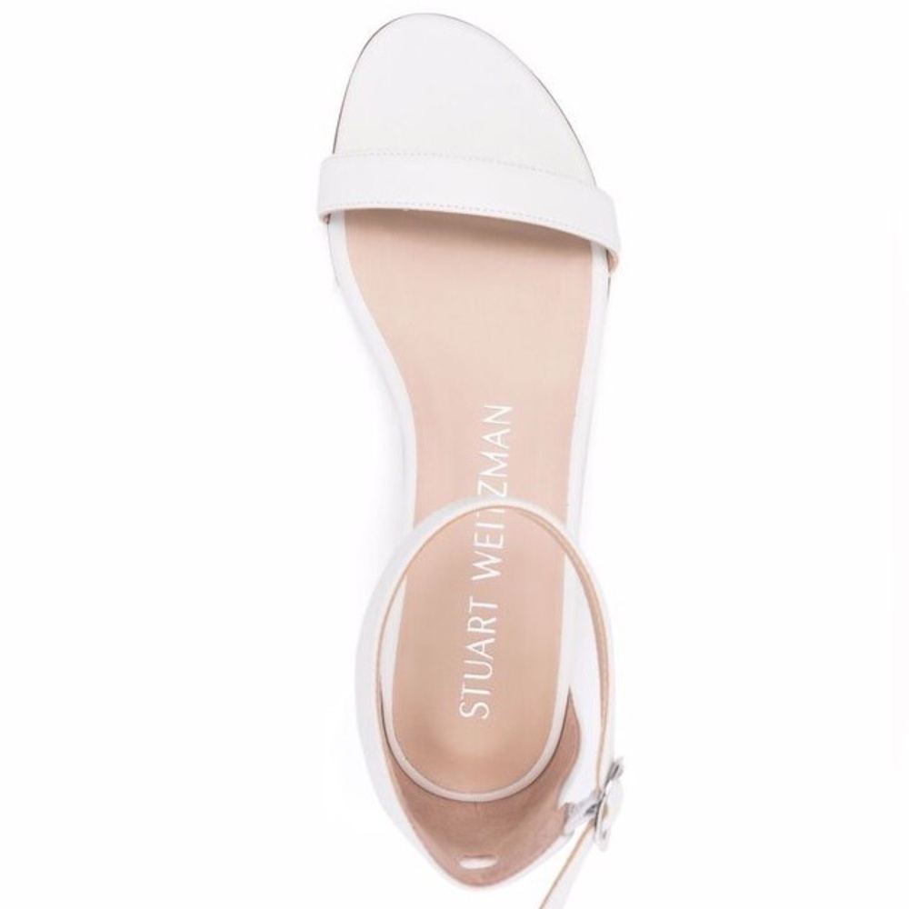 Stuart Weizmann Nudist flat ankle strap sandals.